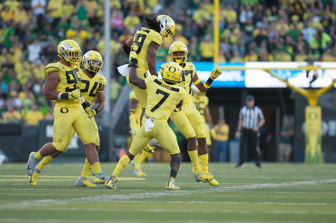 The Oregon Ducks celebrate a play. Oregon Ducks Football hosts Bowling Green in home opener at Autzen Stadium in Eugene, Ore. on Saturday, September 1, 2018. (Devin Roux/Emerald)