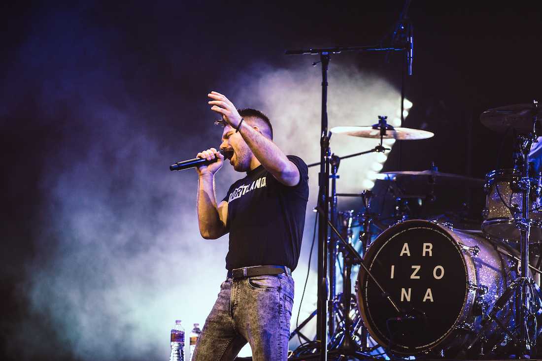 A R I Z O N A vocalist Zach Hannah sings to the Moda Center crowd. A R I Z O N A opens for Panic! At The Disco&#8217;s &#8216;Pray for the Wicked&#8217; tour at the Moda Center in Portland on Aug. 12, 2018. (Sarah Northrop/Emerald)