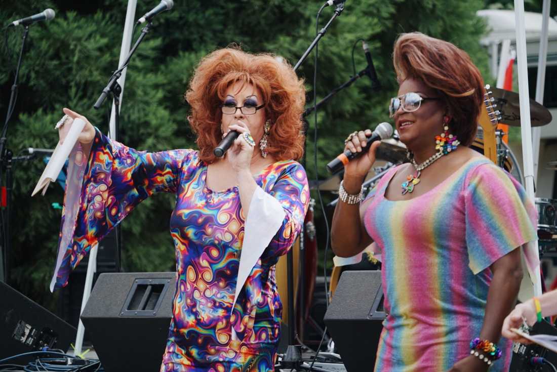 Drag Queens Daphne and Diva of the Glamazons lead the schedule of events. The Pride Festival boasts a large and colorful crowd of friends, families, vendors and performers in Alton Baker Park August 11, 2018. (Dana Sparks/Emerald)