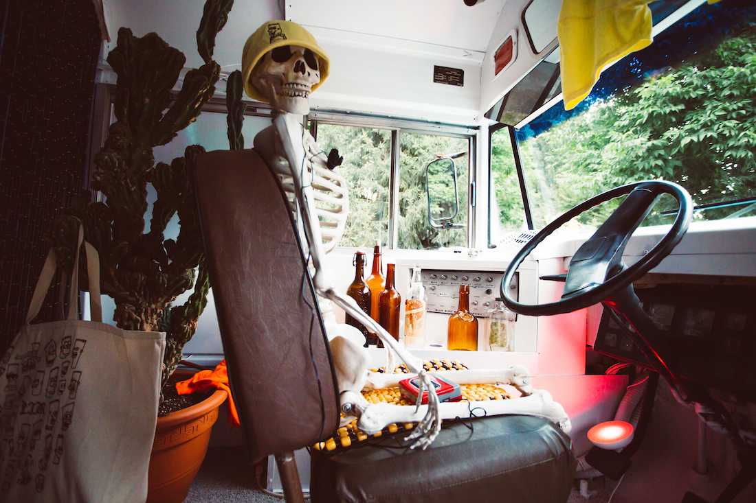 Captained by a grinning skeleton, Portugal. The Man&#8217;s pop-up bus features special merch for the Portland show. &#8216;Lords of Portland&#8217; Portugal. The Man rock their sold-out homecoming residency at the Edgefield on Aug. 25, 2018. (Sarah Northrop/Emerald)