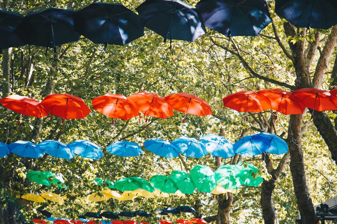 Bumbershoots (umbrellas) decorate the festival grounds. Day one of 2018 Bumbershoot kicks off Labor Day weekend at Seattle Center on Aug. 31, 2018. (Sarah Northrop/Emerald)