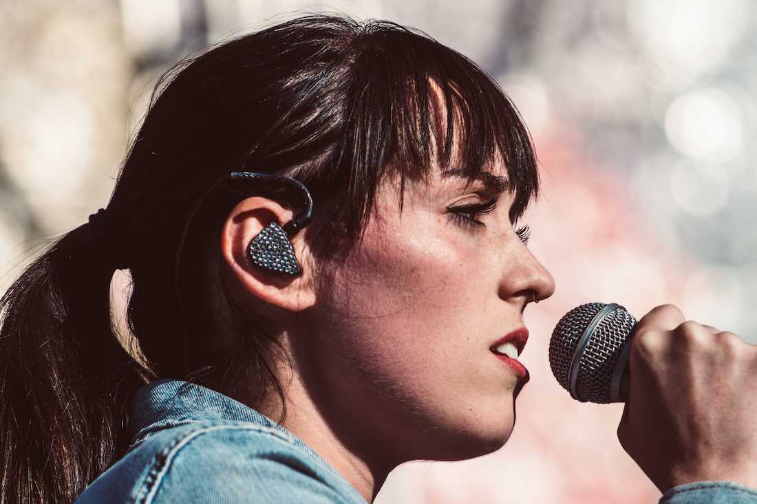 Self-described &#8220;sad-pop&#8221; singer Sasha Sloan sings on the Mural Amphitheater stage. Day three of 2018 Bumbershoot closes out the festival weekend on Sept. 2, 2018. (Sarah Northrop/Emerald)