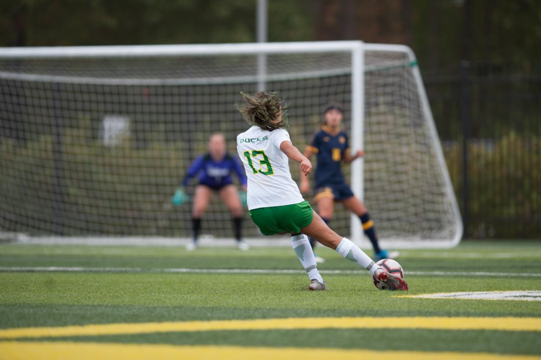 Oregon Ducks defender Mia Palmer (13) attempts to score a goal. Oregon Ducks Womens Soccer takes on UC Berkeley at Pap&#233; Field on Oct. 7, 2018. (Devin Roux/Emerald)