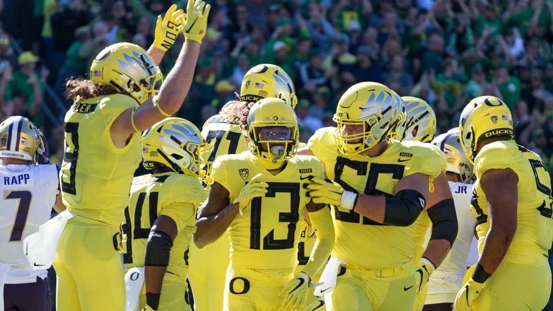 Ducks wide reciever Dillion Mitchell (13) celebrates after his touchdown. Oregon Ducks Football takes on University of Washington at Autzen Stadium on Oct. 13, 2018. (Ben Green/Emerald)