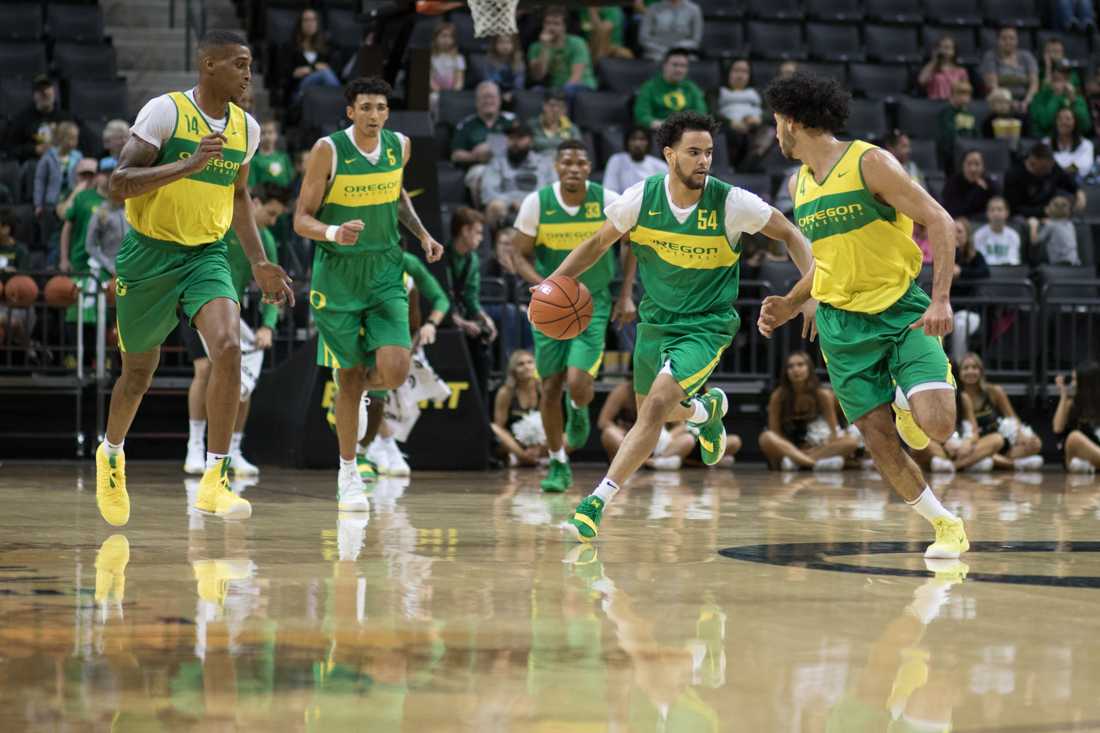 Oregon Ducks guard Will Johnson (54) drives down the court in the men&#8217;s scrimmage. Oregon Ducks Men&#8217;s and Women&#8217;s Basketball host Matt Knight Madness at Matt Knight Arena in Eugene Ore. on October 12. 2018. (Devin Roux/Emerald)