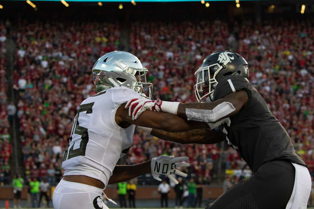 The Ducks hold off a Cougar. Oregon Ducks Football takes on Washington State University at Martin Stadium in Pullman, Wash. on Oct. 20, 2018. (Sarah Northrop/Emerald)