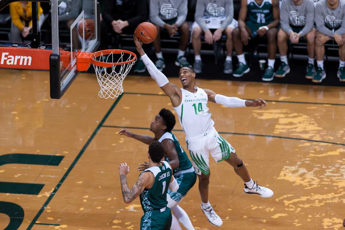 Forward Kenny Wooten (14) steals the rebound out of the air for the Ducks. Oregon Ducks men&#8217;s basketball takes on Green Bay at Matthew Knight Arena in Eugene Ore. on Nov. 20, 2018. (Ben Green/Emerald)