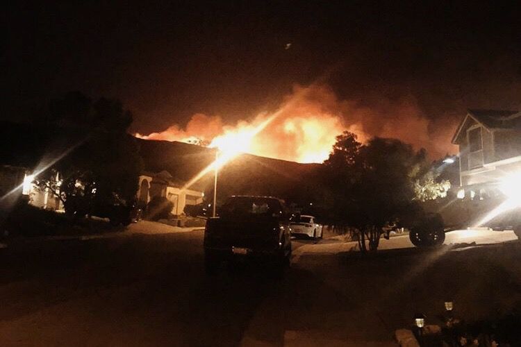 The Woolsey fire in Southern California as seen from a driveway in a Simi Valley, Calif., neighborhood. (Courtesy of Joey Richesson)