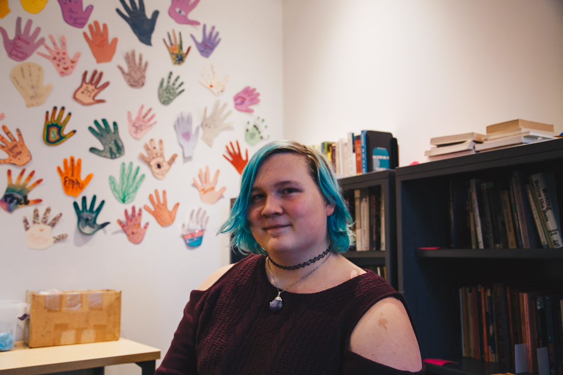 University of Oregon student and activist Talia Keene sits in a colorful corner of the LGBTQA3 Center in the EMU. (Sarah Northrop/Emerald)