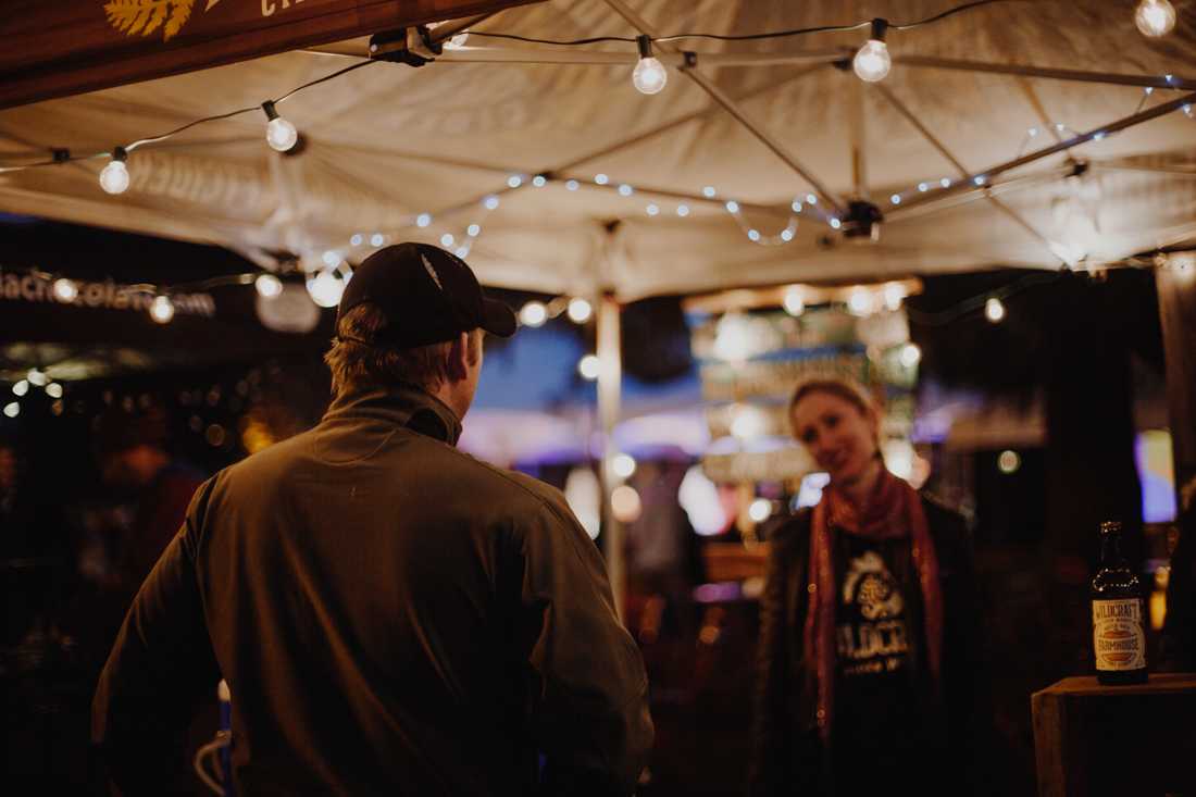 Wildcraft Cider Works sells beverages. EUGfun hosts the "Light Up Downtown" tree lighting ceremony to kick off the holiday season in Eugene, Ore. on Nov. 16, 2018. (Sarah Northrop/Emerald)