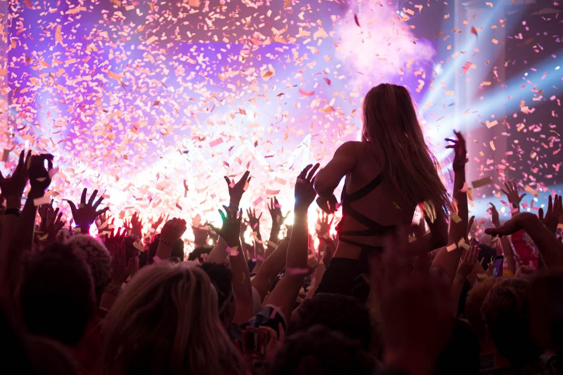 Fans amidst the glitter and confetti dance to the show's finale as Wafia, an opener for Louis the Child, joins a performance onstage.&#160;Louis the Child packs the sold-out McDonald Theatre during their Dear Sense Tour in Eugene, Ore. on Nov. 28, 2018. (Madi Mather/Emerald)