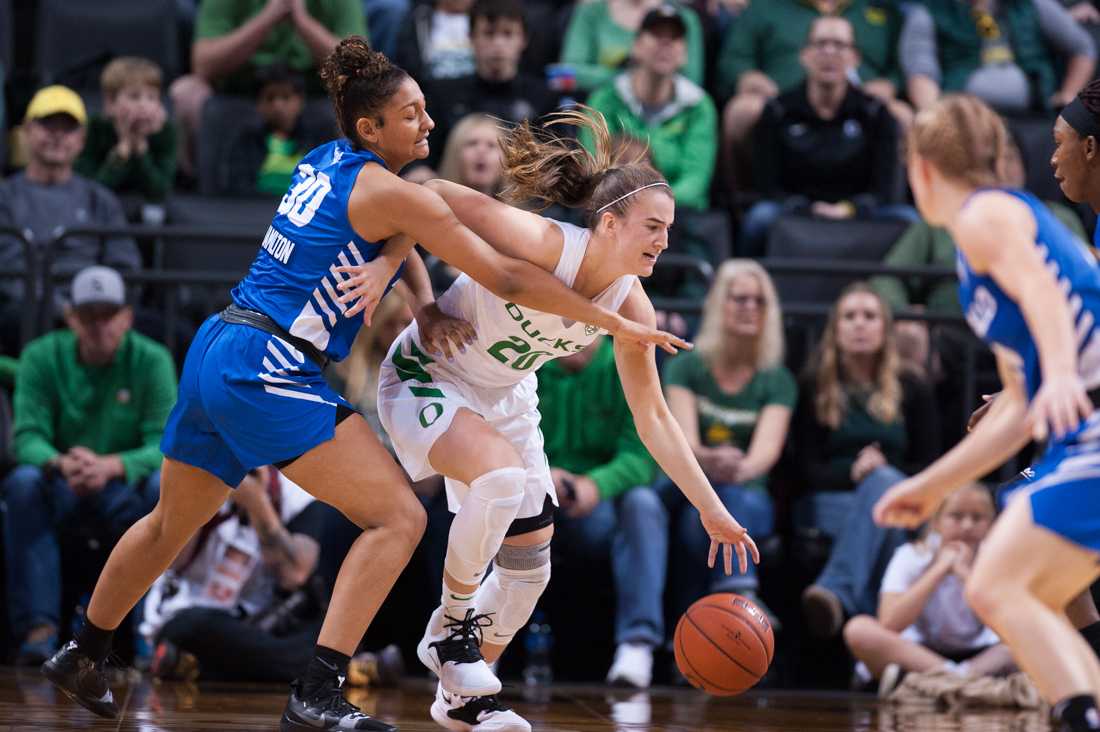 Ducks guard Sabrina Ionescu (20) fights off the Bulls defense to drive the ball up the court. Oregon Ducks women's basketball takes on the Buffalo Bulls at Matthew Knight Arena in Eugene Ore. on Nov. 18, 2018. (Ben Green/Emerald)