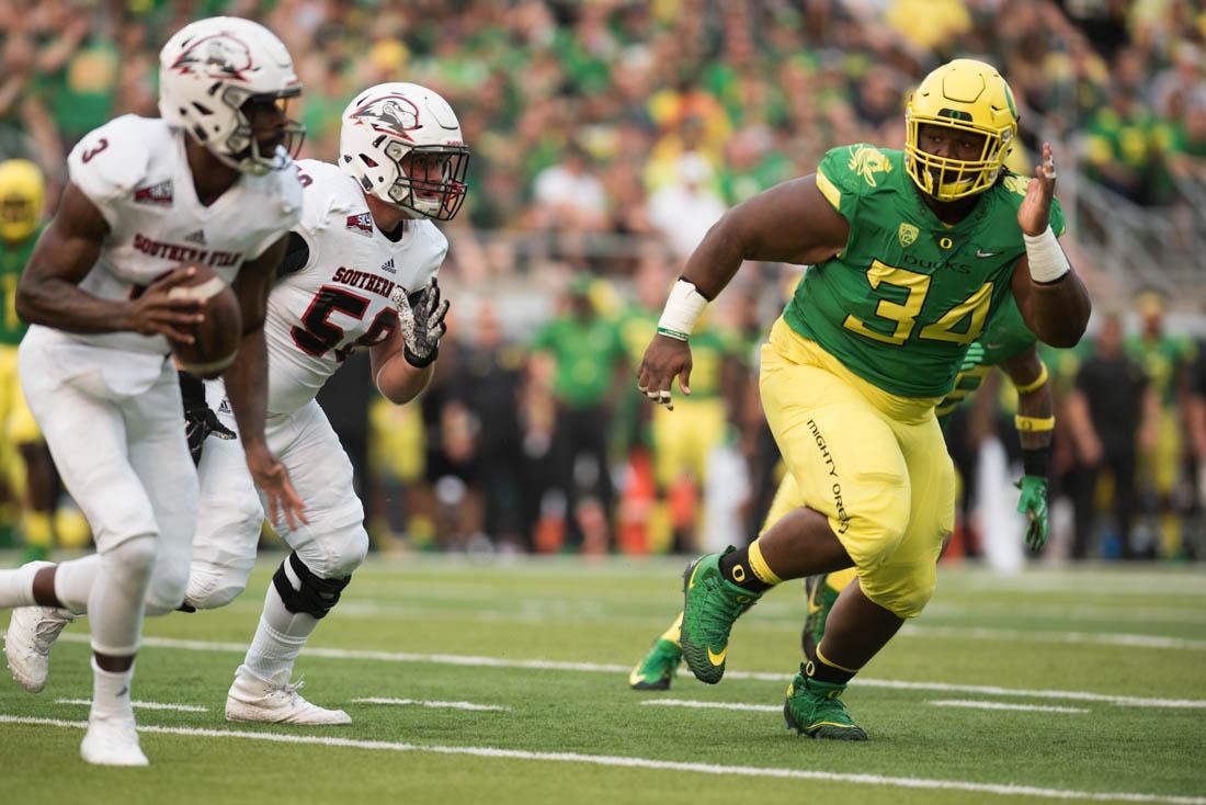 Oregon defensive lineman Jordon Scott (34) chases a quarterback for the Thunderbirds. Oregon Ducks start their season playing against the Southern Utah Thunderbirds at Autzen Stadium in Eugene, Ore. on September 2, 2017. (Phillip Quinn/Emerald)