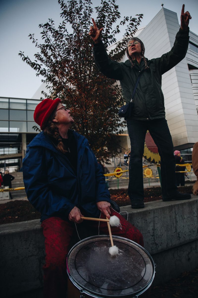 "A new unsettling force": The self-described 350 Eugene rally singers draw people's attention prior to the start of the rally.&#160;Hundreds gather at the 'Nobody is Above the Law' rally to protest President Trump&#8217;s firing of Attorney General Jeff Sessions at the Wayne Morse Federal Courthouse in Eugene, Ore. on Nov. 8, 2018. (Sarah Northrop/Emerald)