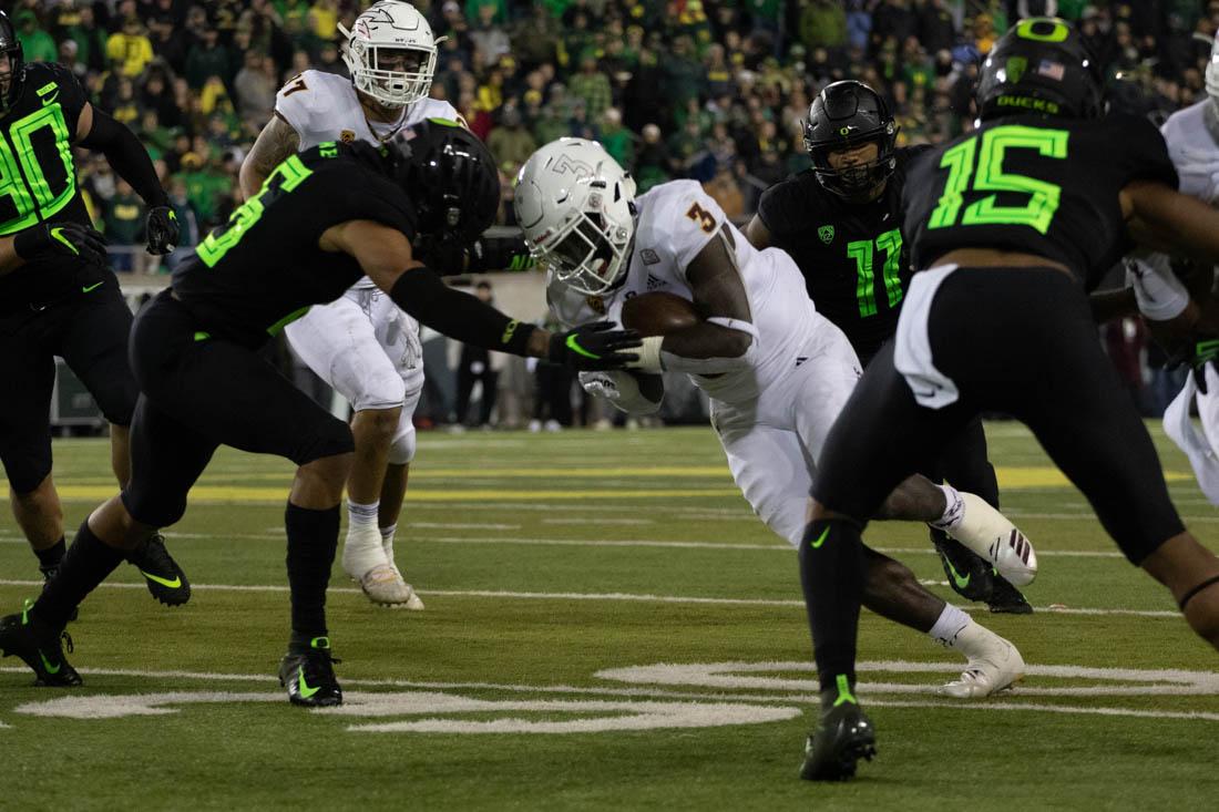 Oregon Ducks defense looks to tackle Arizona State running back Eno Benjamin (3). Oregon Ducks football takes on Arizona State at Autzen Stadium in Eugene Ore. on Nov. 17, 2018. (Devin Roux/Emerald)