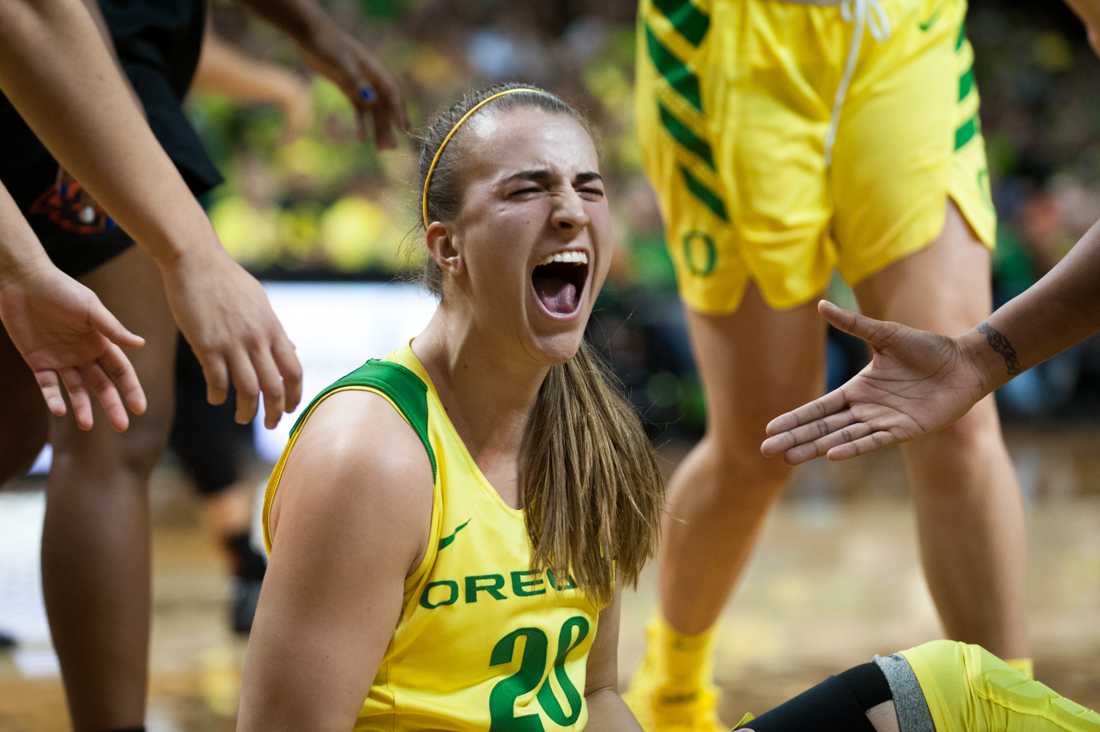 <p>Sabrina Ionescu (20) celebrates after drawing the foul. Oregon Ducks women’s basketball takes on Oregon State University at Matthew Knight Arena in Eugene, Ore. on Feb. 15, 2019. (Ben Green/Emerald)</p>