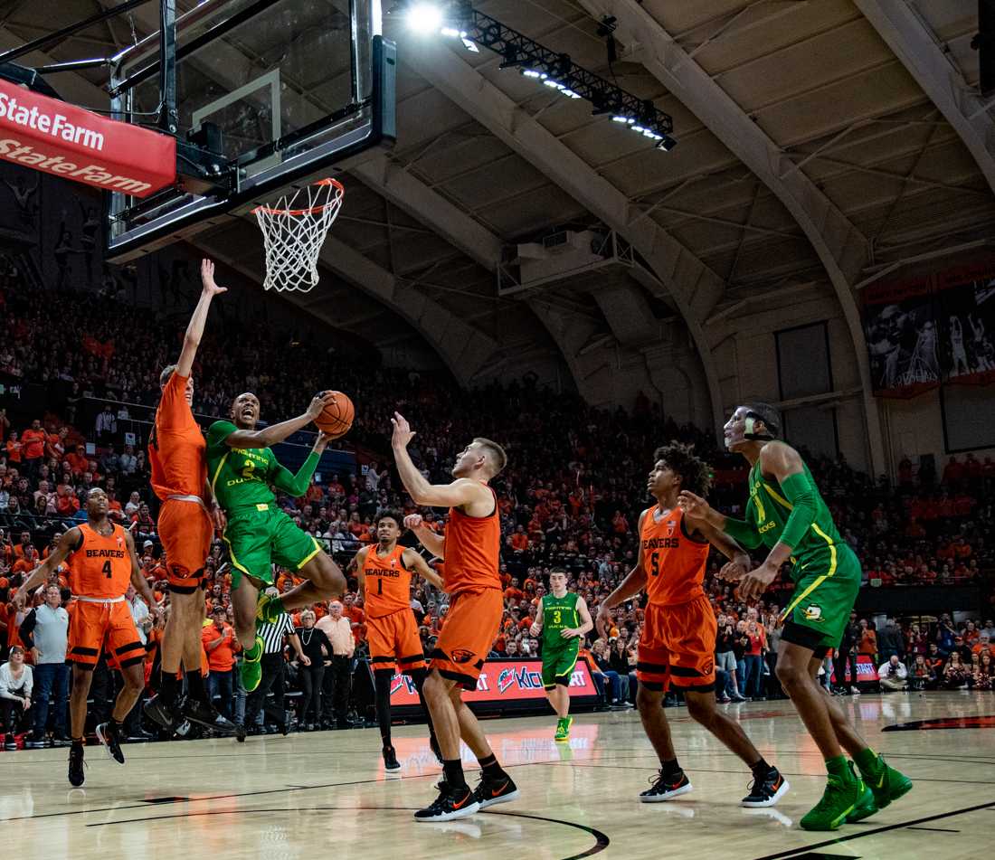 Ducks forward Louis King (2) draws the hard foul. Oregon Ducks men&#8217;s basketball takes on rivals Oregon State University at Gill Coliseum in Corvallis, Ore. on Feb. 16, 2019. (Henry Ward/Daily Emerald)