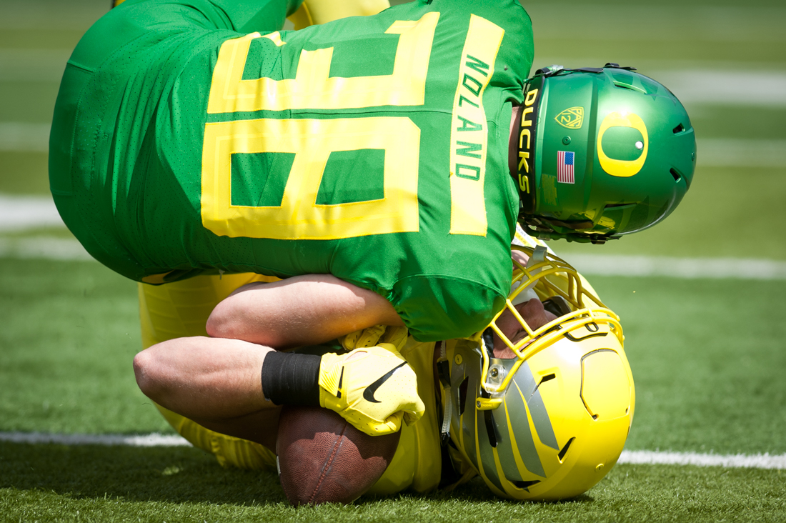 Safety Lucas Noland (38) completes the tackle. Oregon Ducks football plays in the Spring game at Autzen Stadium in Eugene, Ore. on April 20, 2019. (Ben Green/Emerald)