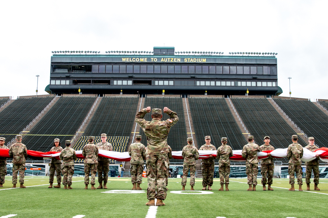 Service members practice opening the flag before the game. Oregon Ducks football&#160;&#160;plays in the Spring game at Autzen Stadium in Eugene, Ore. on April 20, 2019. (Maddie Knight/Emerald)