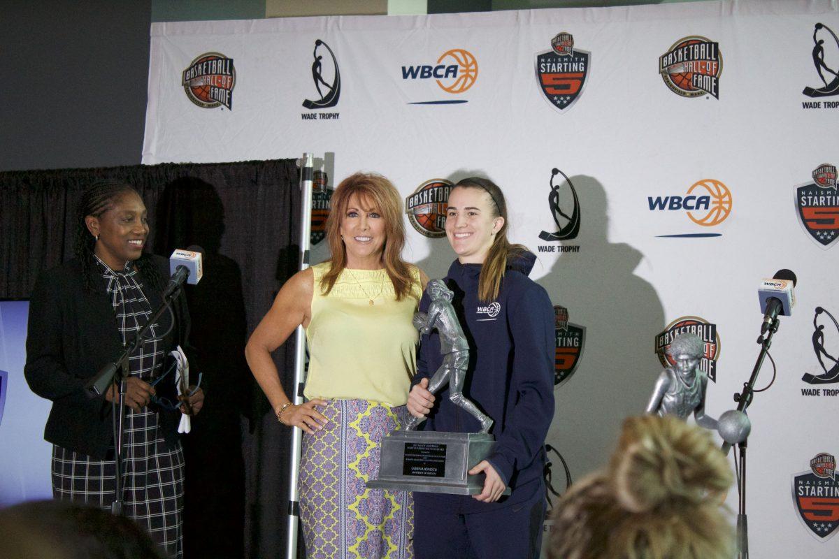 <p>Sabrina Ionescu stands with Nancy Lieberman as Ionescu earns the Nancy Lieberman award for national point guard of the year at the Final Four, in Tampa, Florida, April 4, 2019. (Maggie Vanoni/Emerald)</p>