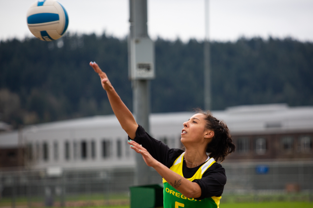 Nicole Villamil (6) serves the ball. Oregon Ducks beach volleyball takes on the Portland Pilots at Amazon Park in Eugene, Ore. on April 6, 2019. (Sarah Northrop/Emerald)