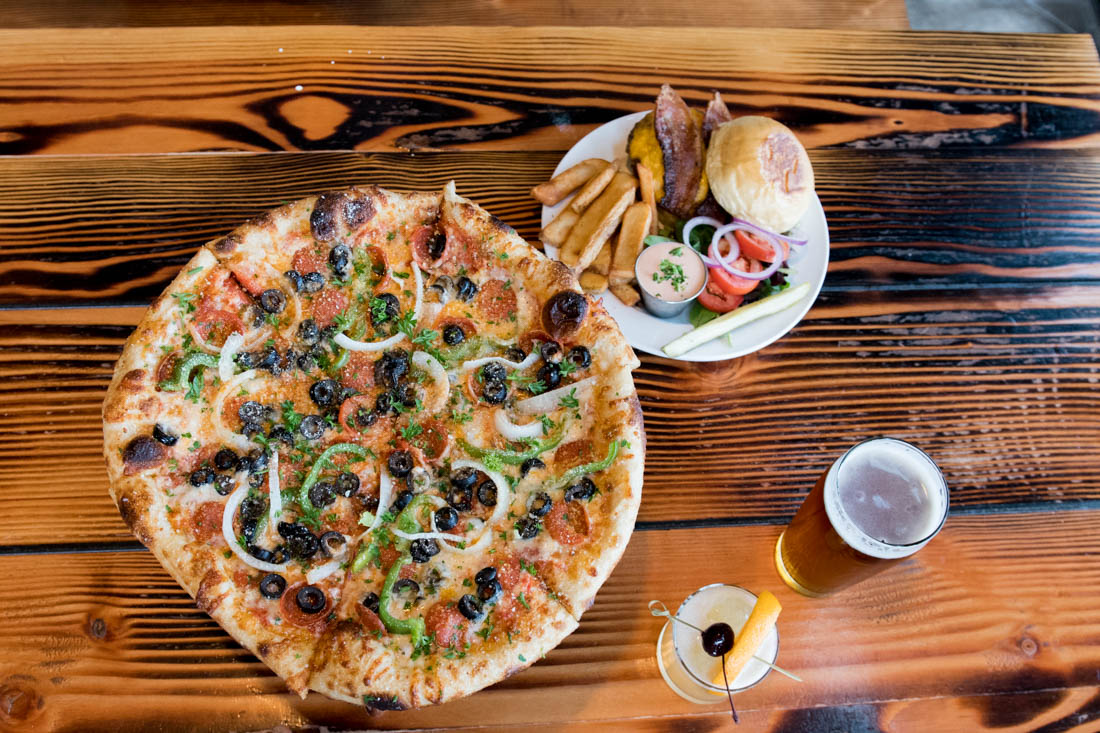 Viking Braggot Company offers a variety of food, including its Norfolk pizza and Pub Burger. Viking Braggot Company, restaurant and taproom, celebrates its one year anniversary in Eugene, Ore. on May 18, 2019. (Madi Mather/Emerald)