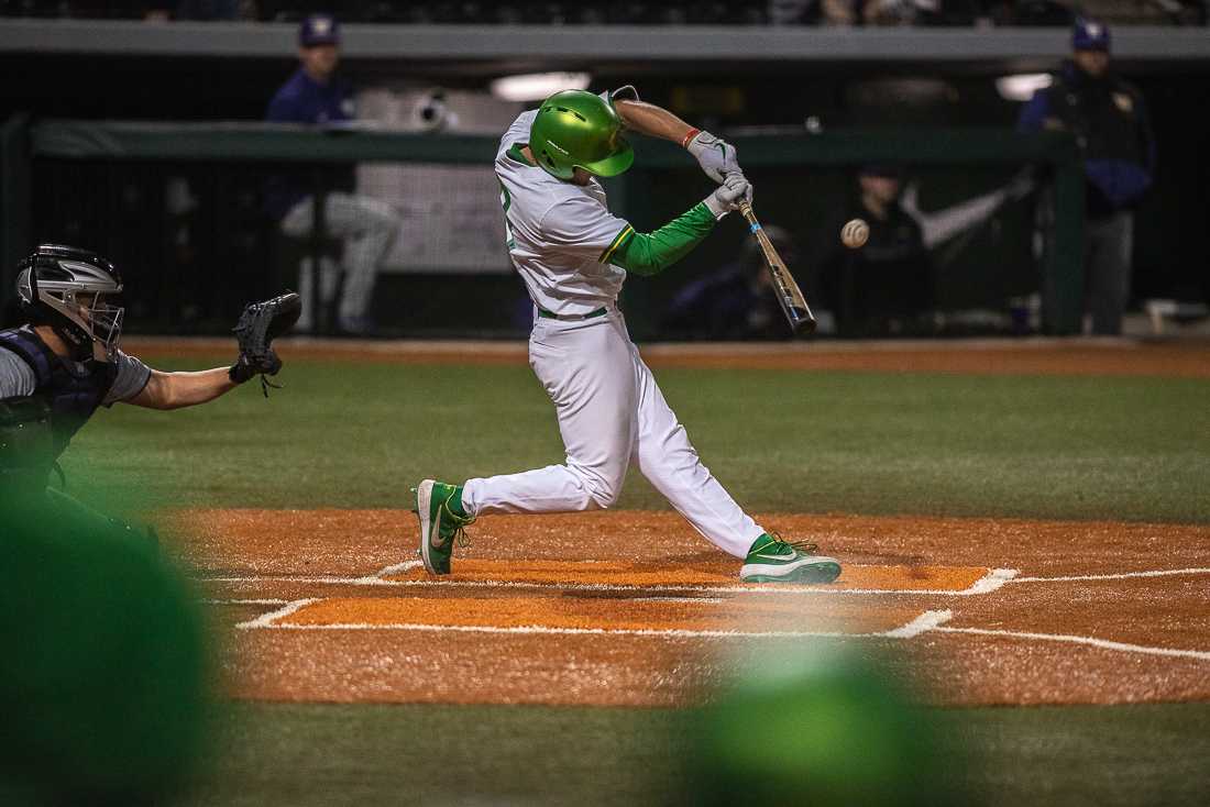 <p>Oregon Ducks infielder Sam Novitske swings and connects. Oregon Ducks baseball takes on University of Washington at PK Park in Eugene, Ore. on Mar. 15, 2019. (Henry Ward/Emerald)</p>