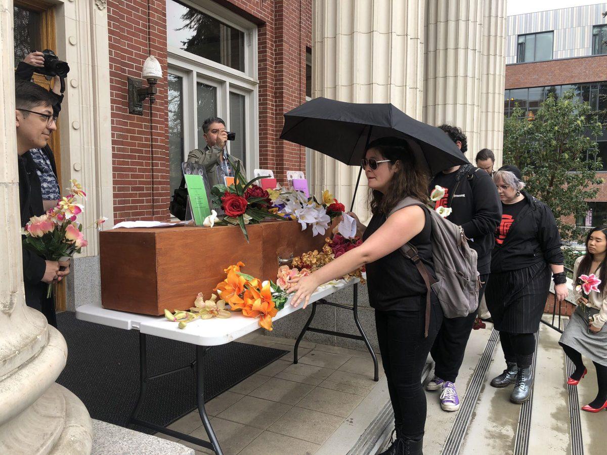 Graduate Employees held a mock funeral procession on April 3 starting at 13th Avenue and ending at Johnson Hall to mourn the end of a 3-year contract with UO.&#160;&#160;(Donny Morrison/Emerald)