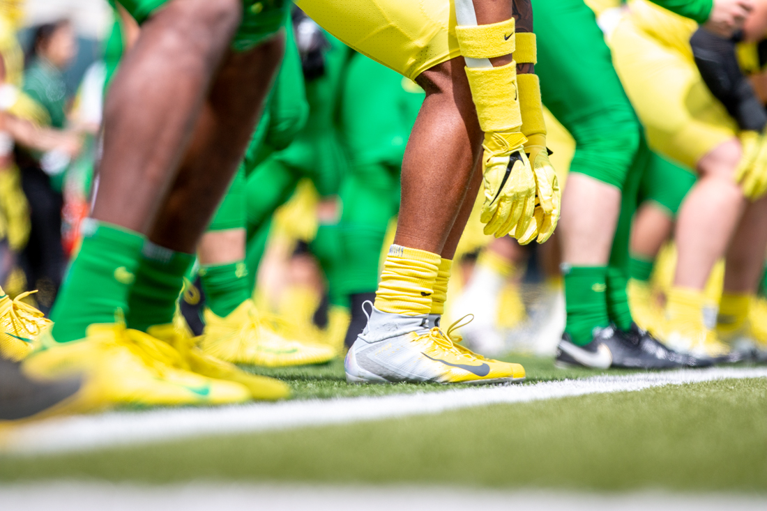 Ducks players line up for drills during their pregame practice. Oregon Ducks football&#160;&#160;plays in the Spring game at Autzen Stadium in Eugene, Ore. on April 20, 2019. (Maddie Knight/Emerald)