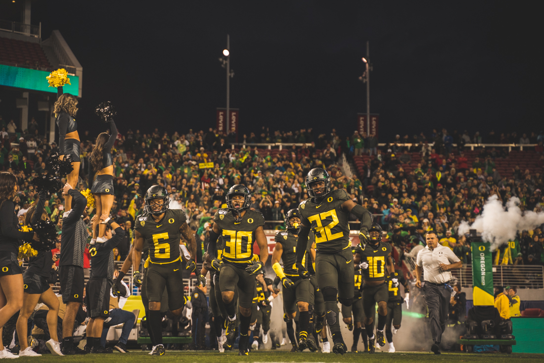 <p>The ducks run onto the field. Oregon Ducks football takes on Utah for the Pac 12 Championship game at Levi's Stadium in Santa Clara, Calif. on Dec. 6, 2019. (DL Young/Emerald)</p>