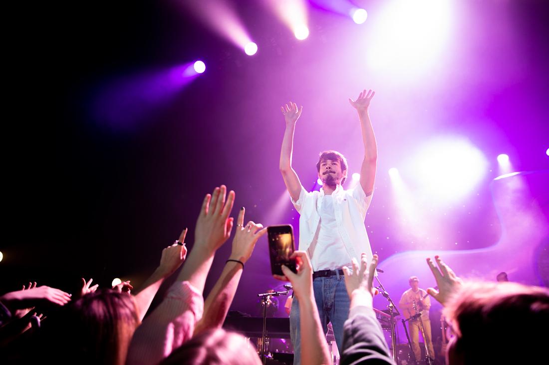 Rex Orange County enters the stage waving at the crowd. Rex Orange County performs at the Keller Auditorium in Portland on Jan. 19, 2020. (Maddie Knight/Emerald)