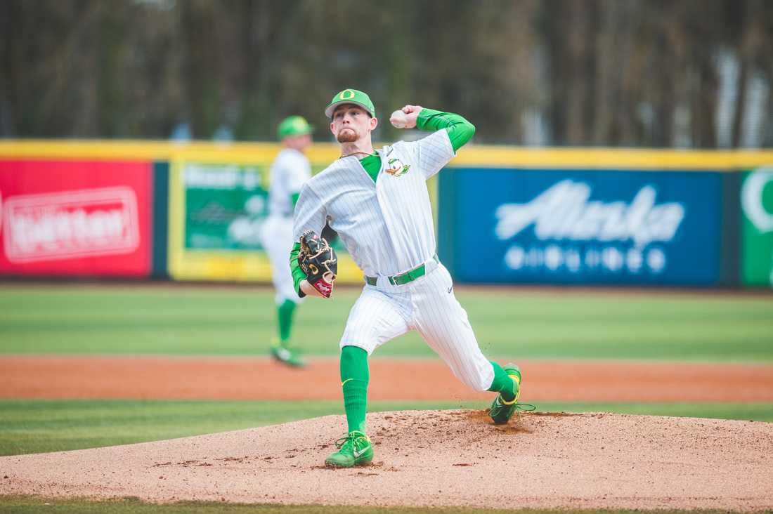 Ducks pitcher Robert Ahlstrom (16) throws during warm ups. Oregon Ducks baseballl takes on Milwaukee at PK Park in Eugene, Ore. on Feb. 29, 2020. (DL Young/ Emerald)