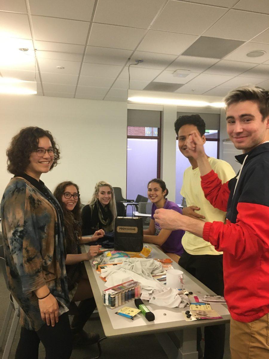 UO ACI club members practice adapting a Halloween costume in October 2019. (Courtesy of Emma Ly)