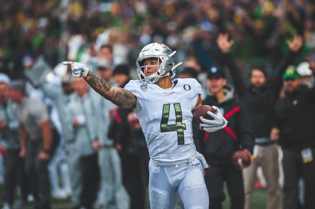 <p>Ducks wide reciever Mycah Pittman (4) points at an opposing husky. Oregon Ducks Football takes on the University of Washington Huskies at Husky Stadium in Seattle, Wash. on Oct. 19, 2019. (DL Young/Emerald)</p>