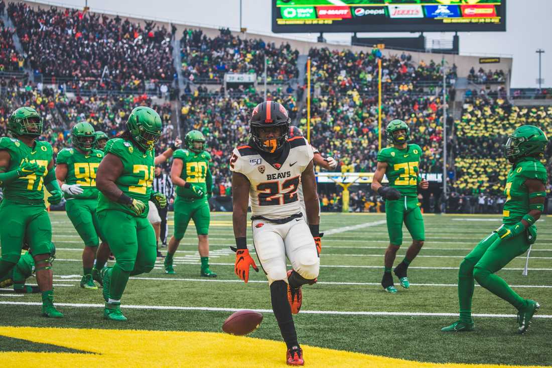 Beavers running back Jermar Jefferson (22) scores a touchdown that would be called back. Oregon Ducks football takes on Oregon State for the Civil War game at Autzen Stadium in Eugene, Ore. on Nov. 30, 2019. (DL Young/Emerald)