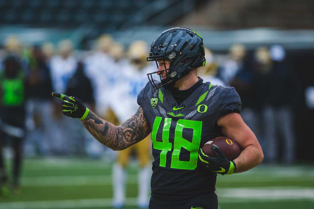 Ducks tight end Hunter Kampmoyer (48) celebrates his touchdown. Oregon Ducks football takes on the UCLA Bruins at Autzen Stadium in Eugene, Ore., on Nov. 21, 2020. (DL Young/Emerald)