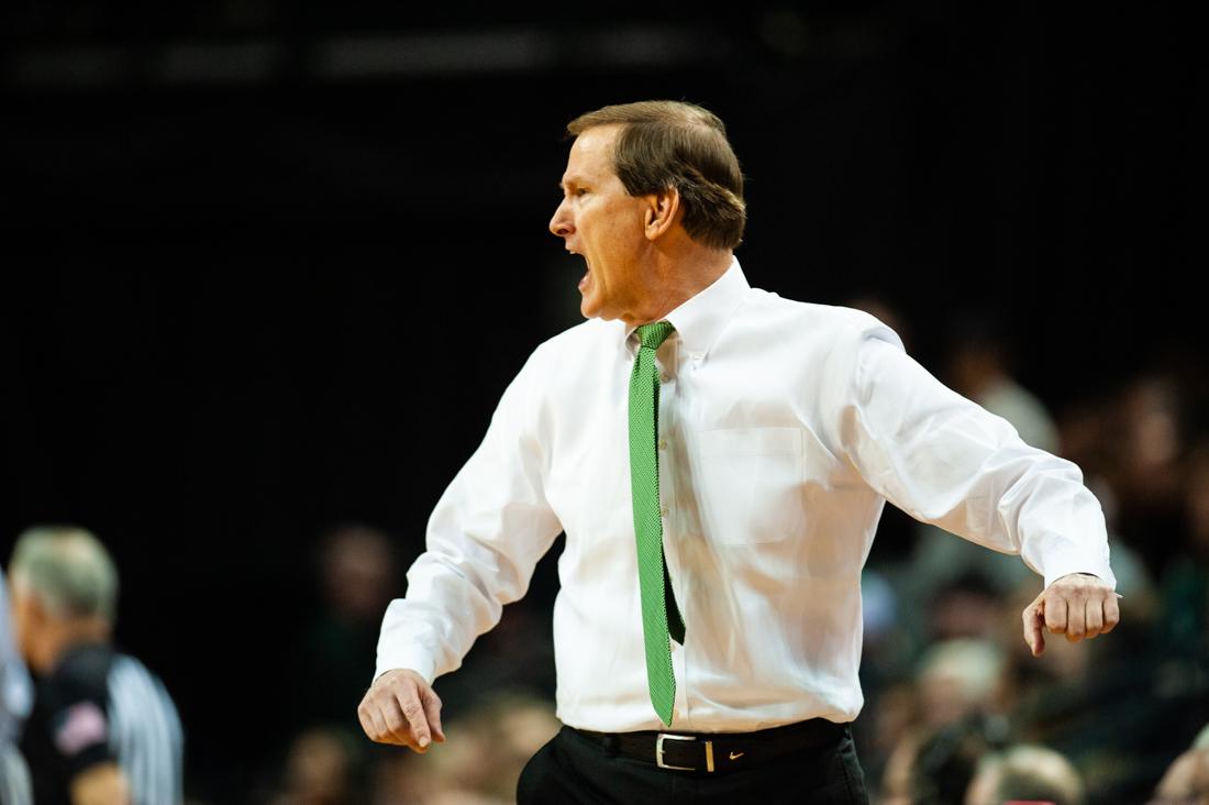 <p>Duck's head coach Dana Altman directs the team from the sideline. Oregon Ducks men's basketball takes on Oregon State at Matthew Knight Arena in Eugene, Ore. on Feb. 27, 2020. (Kimberly Harris/Emerald)</p>