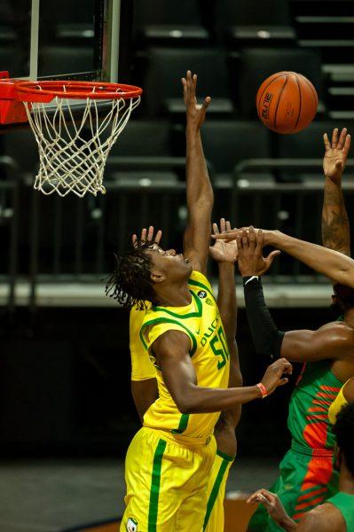 <p>Oregon Ducks forward Eric Williams Jr. (50) blocks a shot. Oregon Ducks take on the Florida A&M Rattlers at Matthew Knight Arena in Eugene, Ore., on Dec. 9, 2020. (Maddie Knight/Emerald)</p>