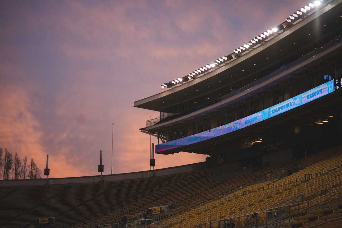 The sun sets over the game. Oregon Ducks football takes on the California Golden Bears at California Memorial Stadium in Berkeley, Calif., on Dec. 5, 2020. (DL Young/Emerald)