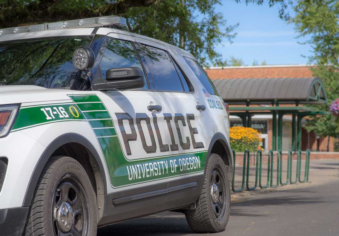 Despite closures due to remote learning, UOPD officers still patrol the campus. A UOPD vehicle is regularly parked at the intersection of 13th and University. Campus-based activist groups across the country call for disarming and defunding their university police departments. Some groups at the University of Oregon have recently made these same demands. (Summer Surgent-Gough/Emerald)