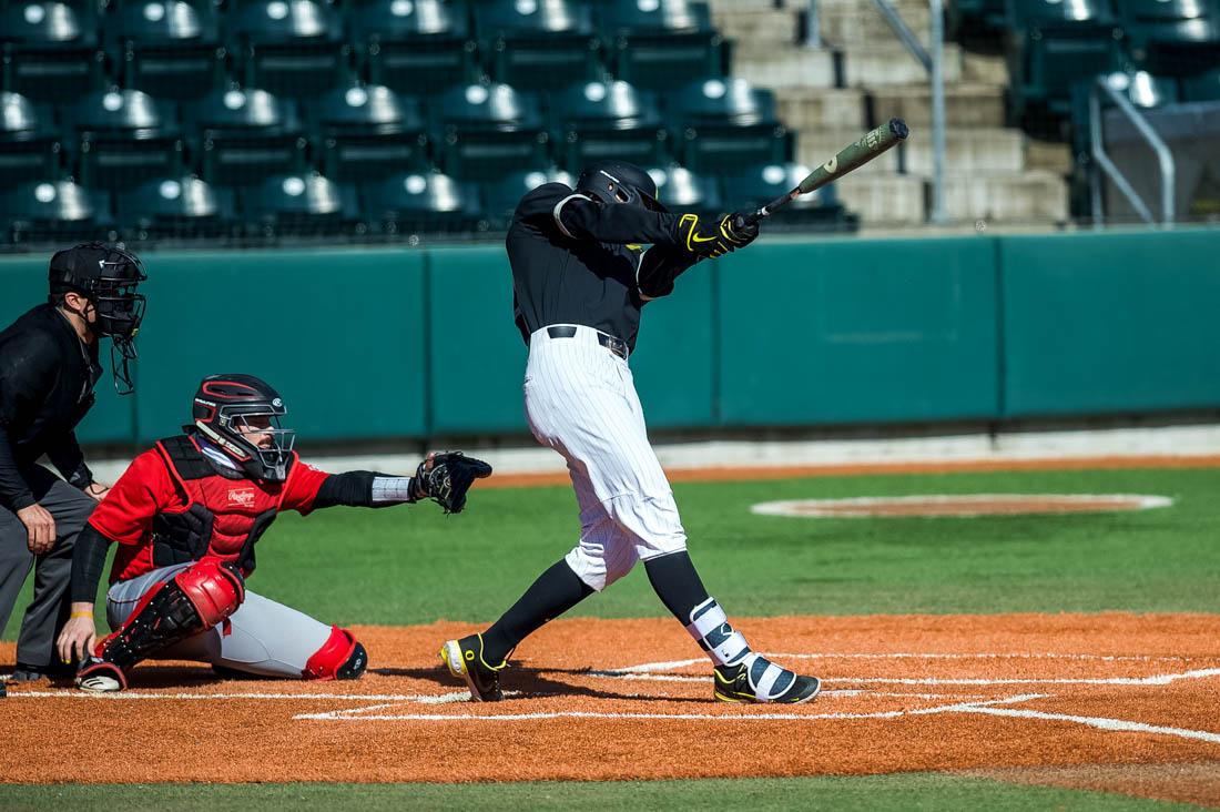 Ducks outfielder Anthony Hall (35) swings at the ball. Oregon Ducks baseball takes on the Seattle University RedHawks at PK Park in Eugene, Ore., on Feb. 28, 2021. (Ian Enger/Emerald)