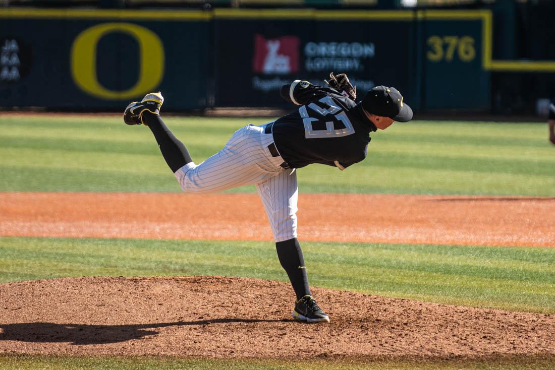 Oregon ducks right-handed pitcher Andrew Mosiello (23) pitches to the RedHawks. Oregon Ducks baseball takes on the Seattle University RedHawks at PK Park in Eugene, Ore., on Feb 28. 2021. (Ian Enger/Emerald)