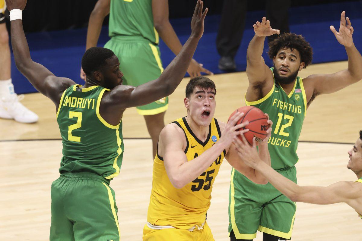 INDIANAPOLIS, IN - MARCH 22: Iowa Hawkeyes against the Oregon Ducks in the second round of the 2021 NCAA Division I Men's Basketball Tournament held at Bankers Life Fieldhouse on March 22, 2021 in Indianapolis, Indiana. (Photo by Jack Dempsey/NCAA Photos via Getty Images