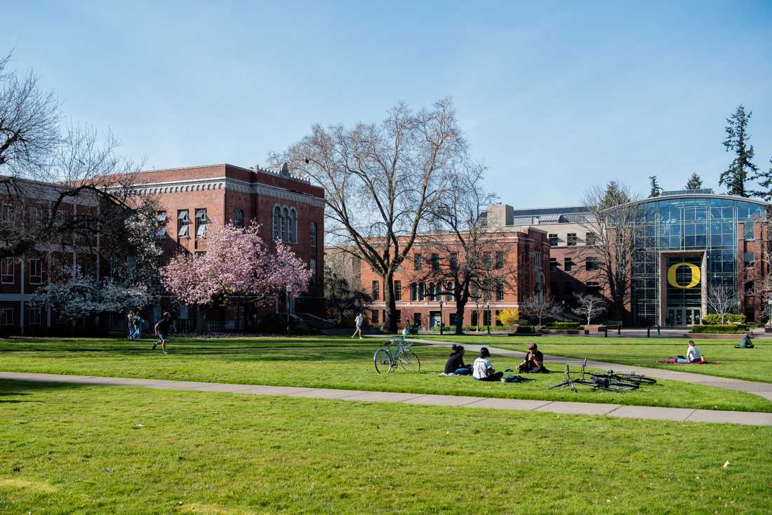 The lawn out front of Lillis Hall is a popular place for students to relax and enjoy the outdoors campus. After a year of adapting to the COVID-19 pandemic, students are back to spending time on the University of Oregon campus and enjoying the spring weather. (Ian Enger/Emerald)