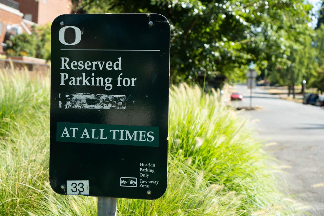 Many of the parking spaces on campus are marked as reserved. (Ali Watson/Emerald)