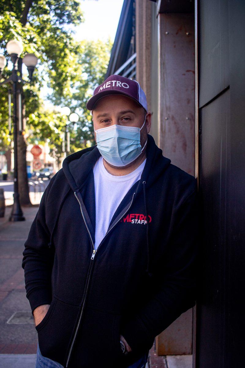 Edward Schiessl, the managing director of the Broadway Metro, poses outside of the theater in downtown Eugene. The Broadway Metro, located in downtown Eugene, is Eugene's last remaining independent theater. (Will Geschke/Emerald)