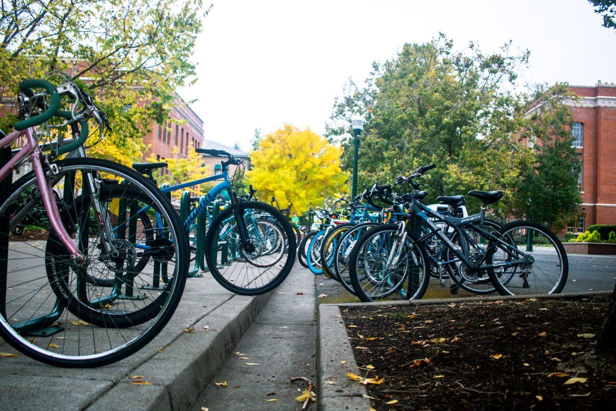 A row of bikes rests on bike racks outside of Lillis Hall at the University of Oregon on the morning of October 7, 2021. Bike thefts in Eugene, Oregon, are a pervasive and signifigant issue affecting the community. (Will Geschke/Emerald)