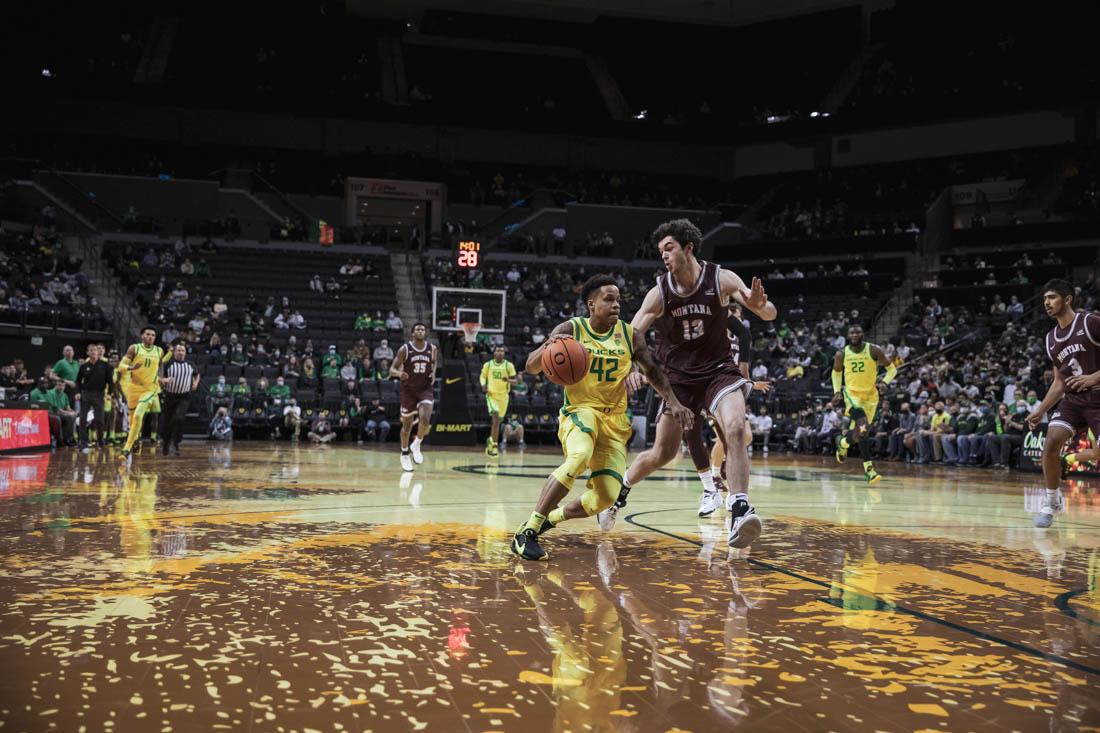 Ducks guard Jacob Young (42) rushes the ball down court. Oregon Ducks take on Montana Grizzlies at Matthew Knight Arena in Eugene, Ore., on Nov, 29, 2021 (Maddie Stellingwerf/Emerald)