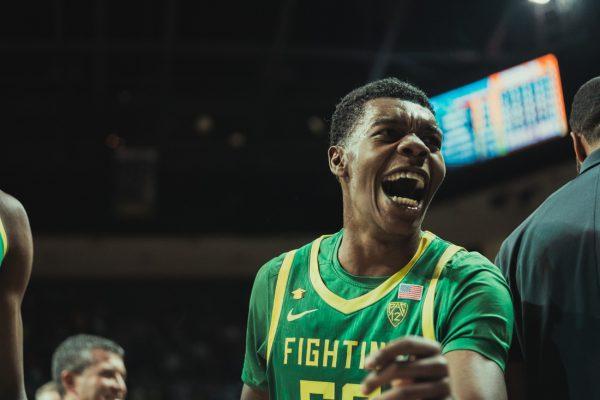 <p>Eric Williams Jr. yells out after sinking a half court shot to end the half. The Oregon Ducks Men’s Basketball team faces the Oregon State Beavers, on January 29th, 2022, at Matthew Knight Arena. (Serei Hendrie/Emerald)</p>