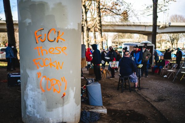 A church service provides a free breakfast on most Sunday mornings for the people living in Washington Jefferson Park. Washington Jefferson Park, which has served as a sanctioned campsite for unhoused people for a year, will be closed by the city soon. (Will Geschke/Emerald)